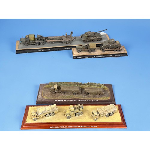 18 - A group of four detailed military diorama models, including RAF desert vehicles display, IHC M426 fu... 
