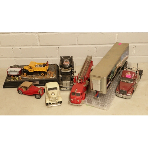 154 - A Large Mac truck together with a Peterbilt cab and container, Franklin mint etc
