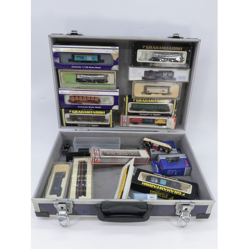 135 - A flight case containing a selection of N gauge railway wagons and carriages including Dapol, Lemur,... 