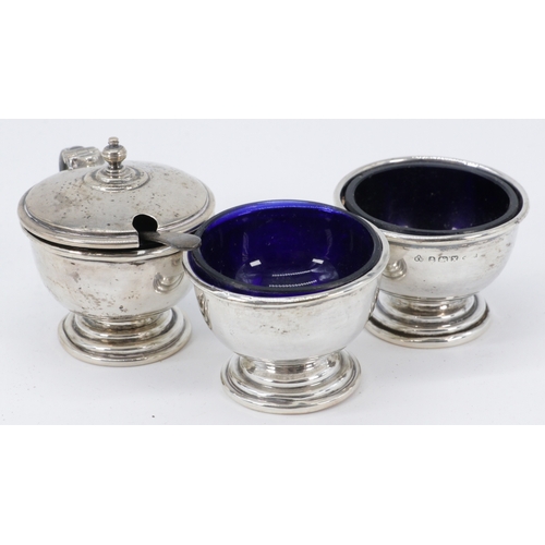 282 - Pair of silver hallmarked salts with blue glass liners, together with a lidded similar and liner and... 