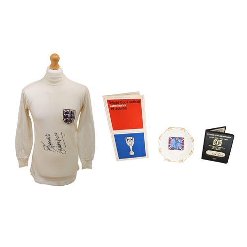 World Cup: A 1966 World Cup, England home shirt, match-issued to Ian Callaghan for the duration of the tournament, signed 'Best Wishes, Ian Callaghan'. Manufactured by Umbro, this iconic shirt has Callaghan's '20' stitched to the reverse, with badge embroidered to the front of the shirt. The shirt does have slight staining, but generally very good.