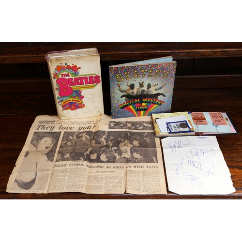 The Beatles Autographs. 1963. Signed in an autograph book - John, Ringo and George signed on one page and Paul McCartney signed on another page. These were all obtained by our vendor in 1963 as she recalls her experience. Please note that also she featured in the Daily Express in November of 1963 and this is also included in the sale along with a coin that Paul gave her. Please read the story of that day in the words of Pam.