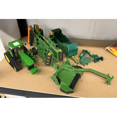 104 - Model John Deere Tractor together with Rolling Stock