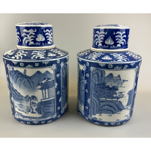 107 - Pair of oriental blue and white lidded pots - Approx. W21cm H31cm