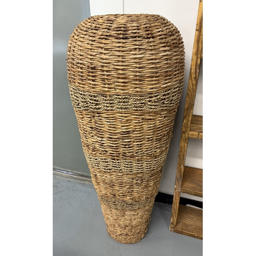 139 - Large floor standing terracotta vase with a wicker wrap - Approx. H124cm