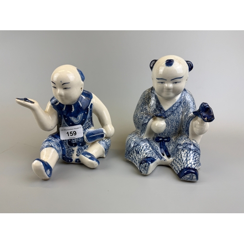 159 - 2 oriental blue & white ceramic figurines - Approx. W13cm H18cm & W12cm H16cm