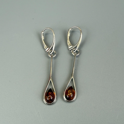 16 - Pair of silver amber set drop earrings