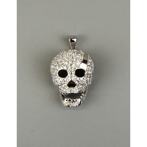 23 - Silver stone set skull pendant