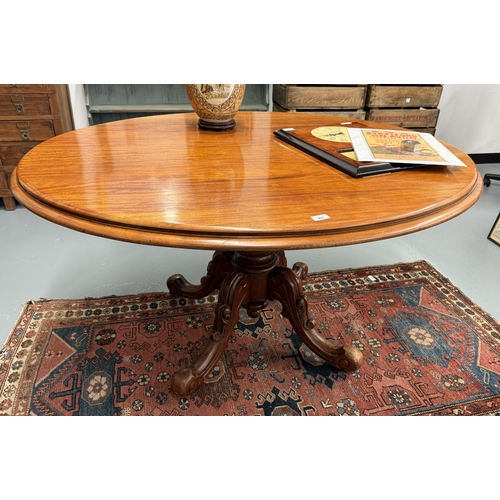 365 - Mahogany oval pedestal tilt top dining table (missing bolts) - Approx. W137cm H74cm D112cm