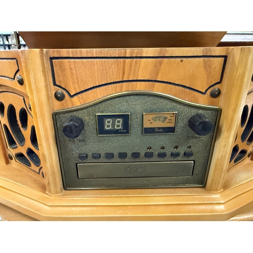 273 - Phonograph A/FM radio cassette and CD player - Approx. W45cm H20cm D34cm