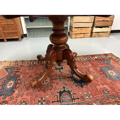 365 - Mahogany oval pedestal tilt top dining table (missing bolts) - Approx. W137cm H74cm D112cm