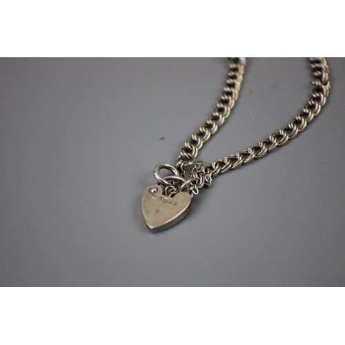 52 - Silver Charm Bracelet Approx. Weight 7.4g