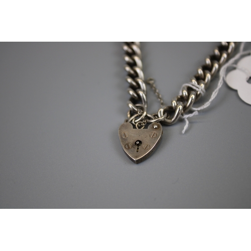 56 - Heavy Silver Charm Bracelet Approx. Weight 27.5g