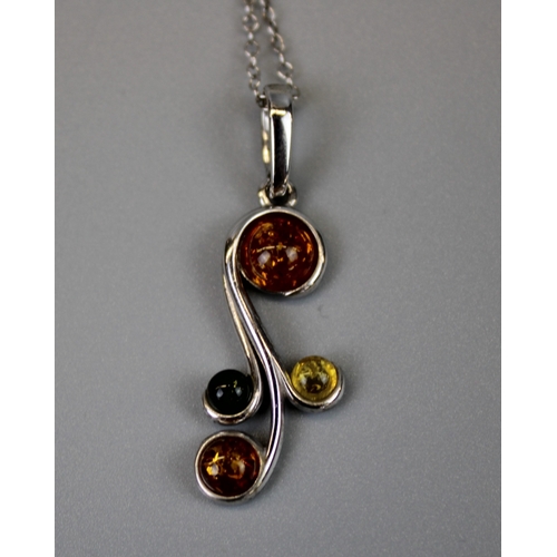 67 - Silver Amber Set Pendant on Silver Chain