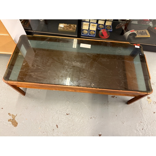 573 - Mid Century Myer Teak Coffee Table with Smoked Glass Top&nbsp;Approx. L 112 cm W 48cm H 36cm