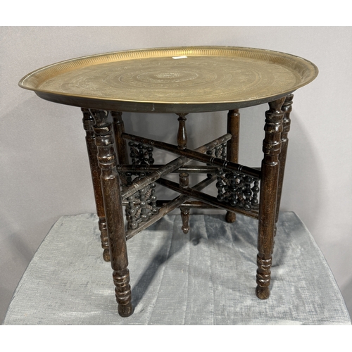 A Folding Brass Topped Eastern Table