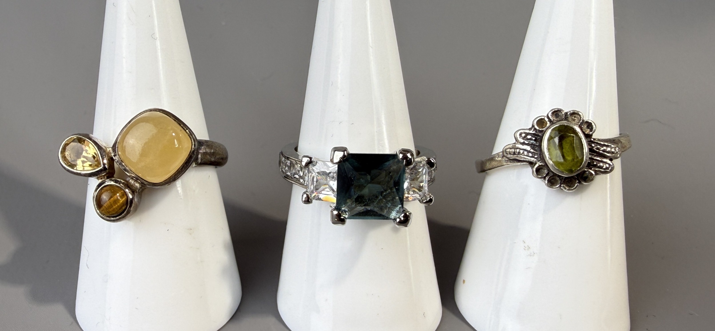 Three Silver Stone Set Rings
