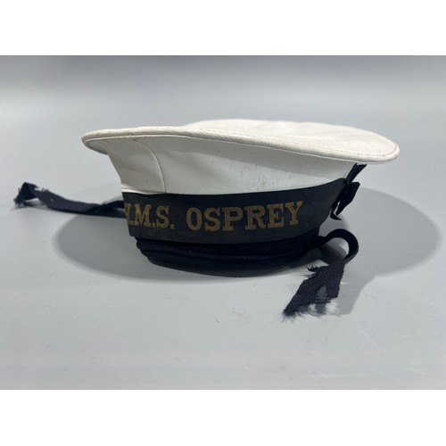 135 - Royal Navy Cap together with a Collection of Cap Tallies