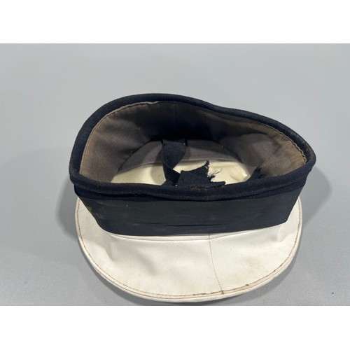 135 - Royal Navy Cap together with a Collection of Cap Tallies