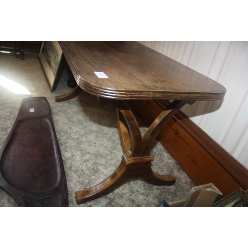 1013 - A mahogany coffee table