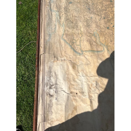 1023 - A very large educational map of East Anglia on long rolled pole, approx. size 127