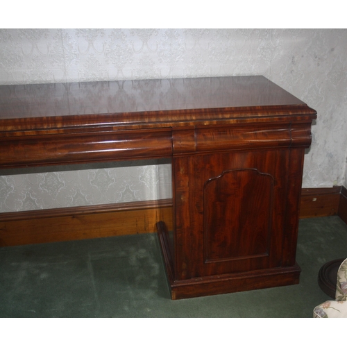 1037 - A large Victorian mahogany pedestal sideboard with three drawers and cellaret drawer, width 83