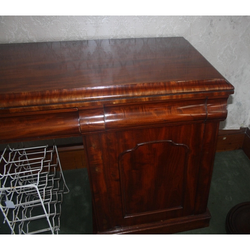 1037 - A large Victorian mahogany pedestal sideboard with three drawers and cellaret drawer, width 83