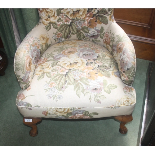 1039 - A 1920's upholstered chair, width 24