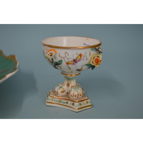 105 - A 19th Century hand painted dish decorated with a bird to the centre, 11