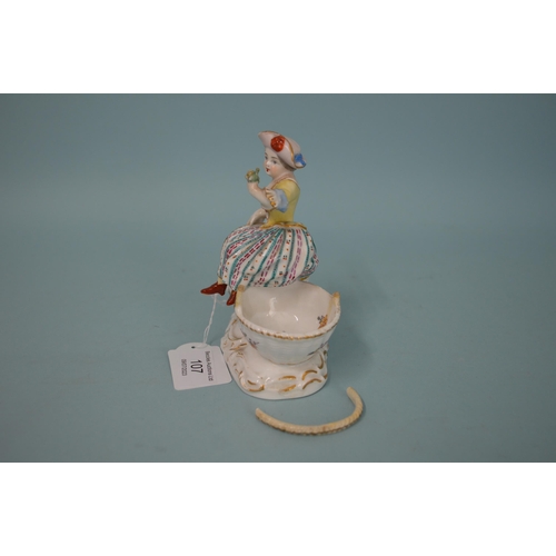 107 - A 19th Century crossed swords mark Meissen style hand painted figure of a girl sitting on two basket... 