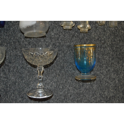 11 - A box of mixed vintage glassware including a set of six champagne saucers, four 'Richardsons' champa... 