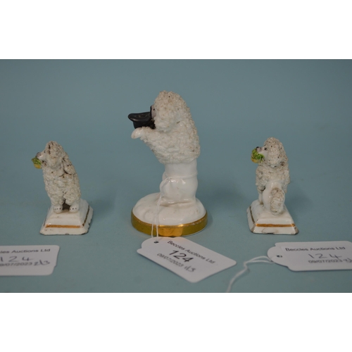 124 - Three 19th Century Staffordshire porcelain poodles, the larger with hat in mouth on gilded base, 3