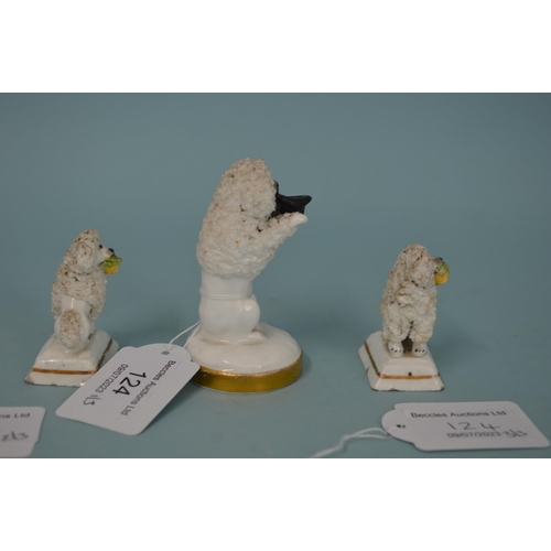 124 - Three 19th Century Staffordshire porcelain poodles, the larger with hat in mouth on gilded base, 3