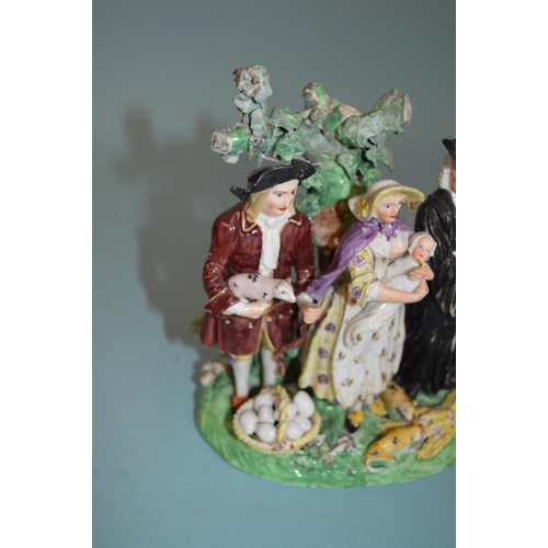 135 - A late 18th Century Derby Dewsbury period humorous porcelain figure group with a parson and a couple... 