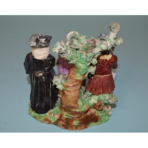 135 - A late 18th Century Derby Dewsbury period humorous porcelain figure group with a parson and a couple... 