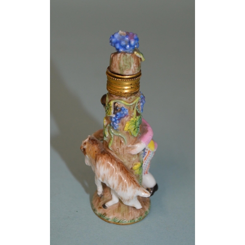 136 - Two late 18th Century/early 19th Century porcelain figural perfume bottles, each modelled as a figur... 