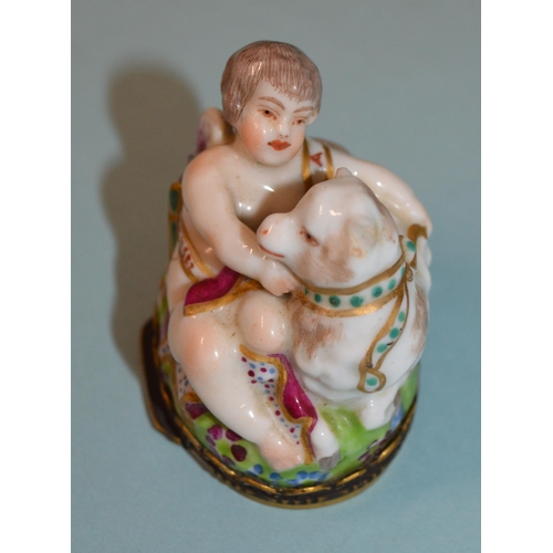 137 - An early 19th Century possibly Samson porcelain figural bonbonniere in the Chelsea style modelled wi... 