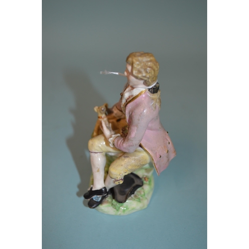 138 - A late 18th Century Derby Dewsbury period male figurine with dog, pad mark to base and impressed num... 