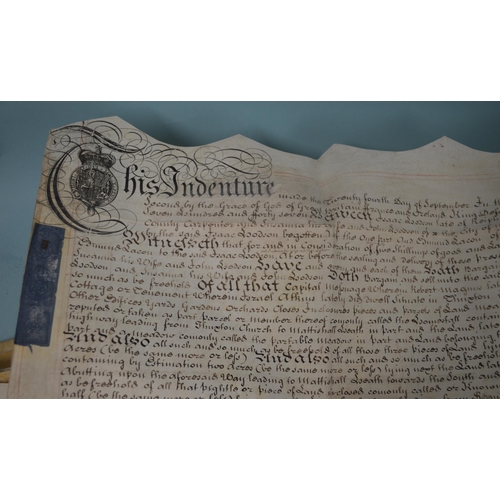 169 - Five 18th Century legal documents and indentures, mainly on vellum, including 1711 Queen Anne with l... 