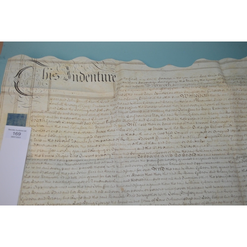 169 - Five 18th Century legal documents and indentures, mainly on vellum, including 1711 Queen Anne with l... 