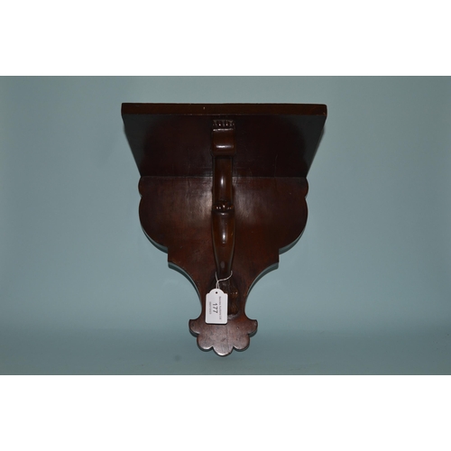 177 - A Victorian mahogany wall bracket with hairy paw base, 12