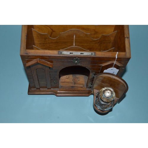 178 - A Victorian mahogany stationery box with a lift lid and an opening door to the front which holds a f... 