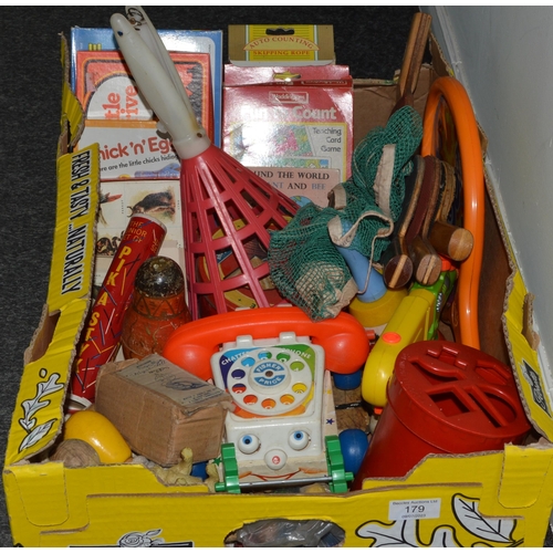 179 - A box of mixed vintage kids toys including boxed games, Fisher Price telephone etc