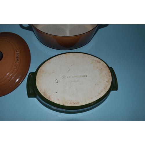 190 - A vintage Le Creuset cast iron lidded casserole dish plus a Le Creuset flat dish (used)