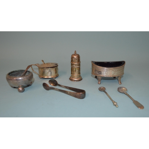 21 - A selection of hallmarked silver condiments including a large Georgian salt etc (most with salt dama... 