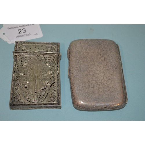 23 - A hallmarked silver cigarette case, a white metal card case plus two silver thimbles