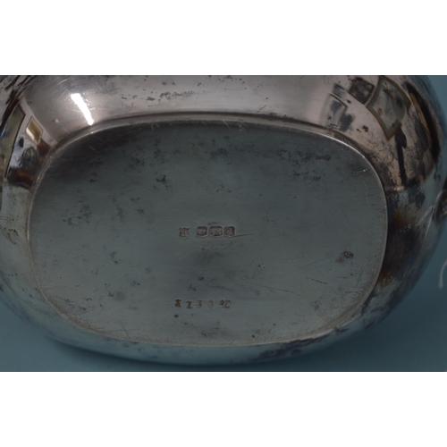 26 - A large sized hallmarked silver sugar and milk, Sheffield 1921, maker CB&S (dent to milk jug), weigh... 