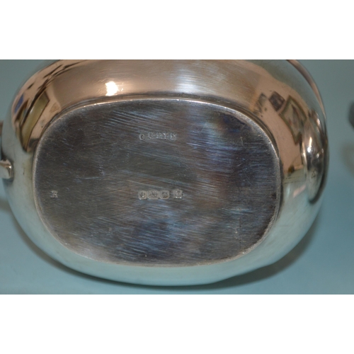 26 - A large sized hallmarked silver sugar and milk, Sheffield 1921, maker CB&S (dent to milk jug), weigh... 