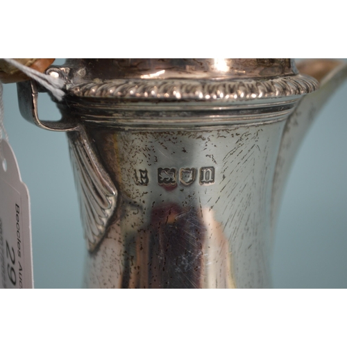 29 - An Edwardian hallmarked silver small hot water lidded jug, London 1908, makers marks rubbed, 7 1/4