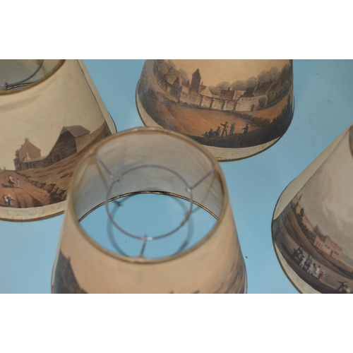 4 - A set of seven late 19th Century printed scene lamp shades, the various prints of London landmark sc... 